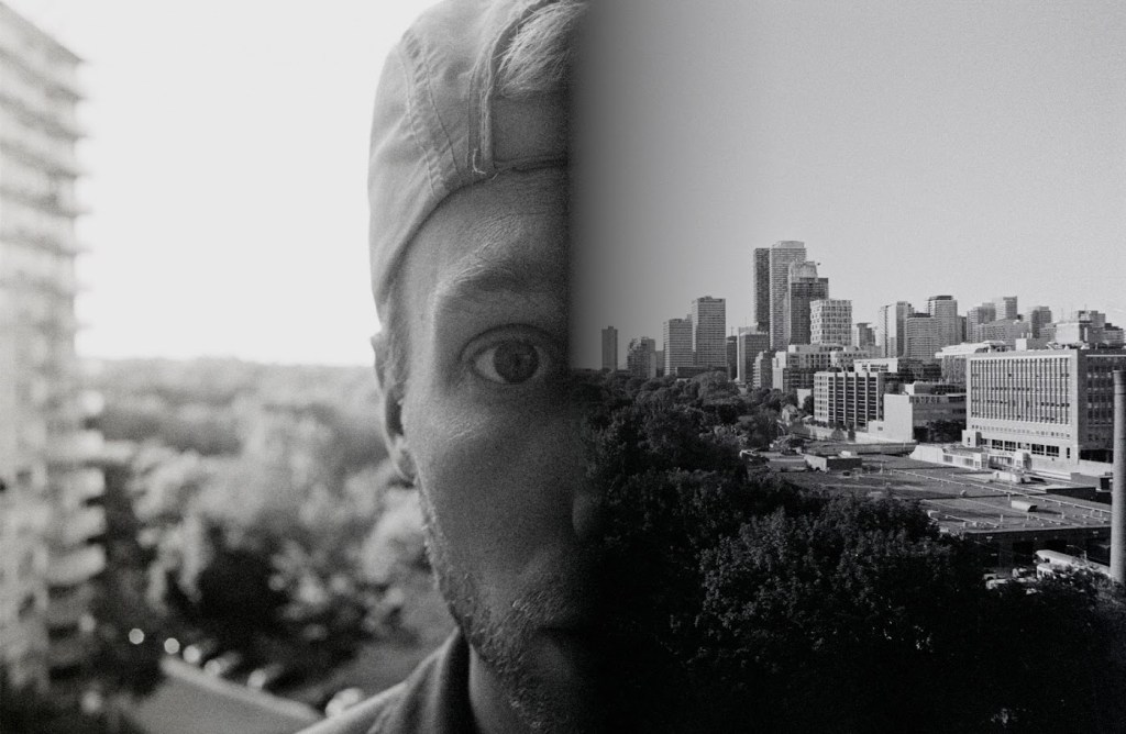 A split image featuring a close-up of a person's face on the left and a city skyline on the right, both in black and white.